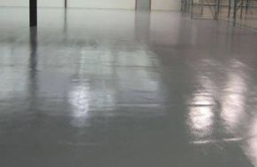 Moisture mitigation service on an industrial floor Moisture Mitigation: How Kaloutas Teams Prevent Concrete Floor Damage